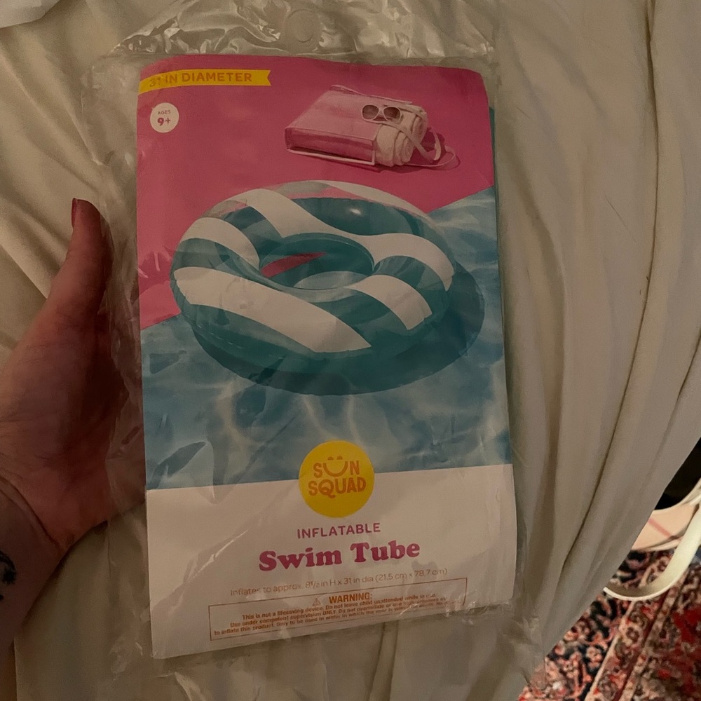 NWT turquoise & white inflatable swim tube